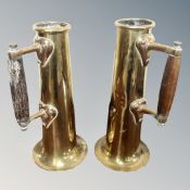 A pair of brass Art Nouveau trench art jugs.