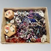 A box containing wooden Oriental style trinket boxes together with a large quantity of costume