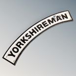 A cast iron wall plaque Yorkshireman.