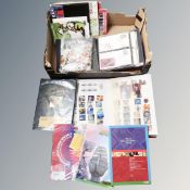 A box of stamp album containing hundreds of British stamps,