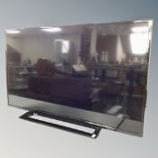 A Toshiba 43" LCD smart TV with remote