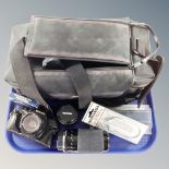 A camera bag containing Miranda MS-1 Super camera with three assorted lenses, accessories etc.