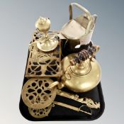 A tray containing antique and later brass wares including watering cans, trivet, kettles,