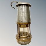 A miner's lamp by The Wolf Safety Lamp Co Wm Maurice Sheffield
