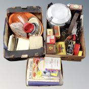 Three boxes containing vintage kitchenalia, tins, glass bottles, recipe books etc.