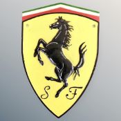 A cast iron wall plaque, Ferrari.