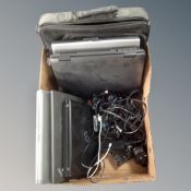 A box containing a laptop bag and five laptops including Lenovo, Dell etc, with leads.