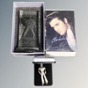 An Elvis Presley pendant on chain, stamped 925,