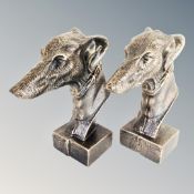 A pair of cast iron greyhound head bookends.