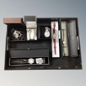 A stitched leather contemporary tray together with six boxed lady's and gents watches including a