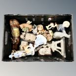 A box containing a Lladro figure of a girl with basket, together with further figurines,
