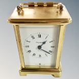 A French brass cased mantel clock, signed Bayard.