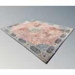 A machine-made carpet of Persian Saroukh design,