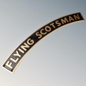 A cast iron wall plaque, the Flying Scotsman.