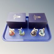 A set of four Royal Worcester Art Deco ceramic candle snuffers in two boxes.