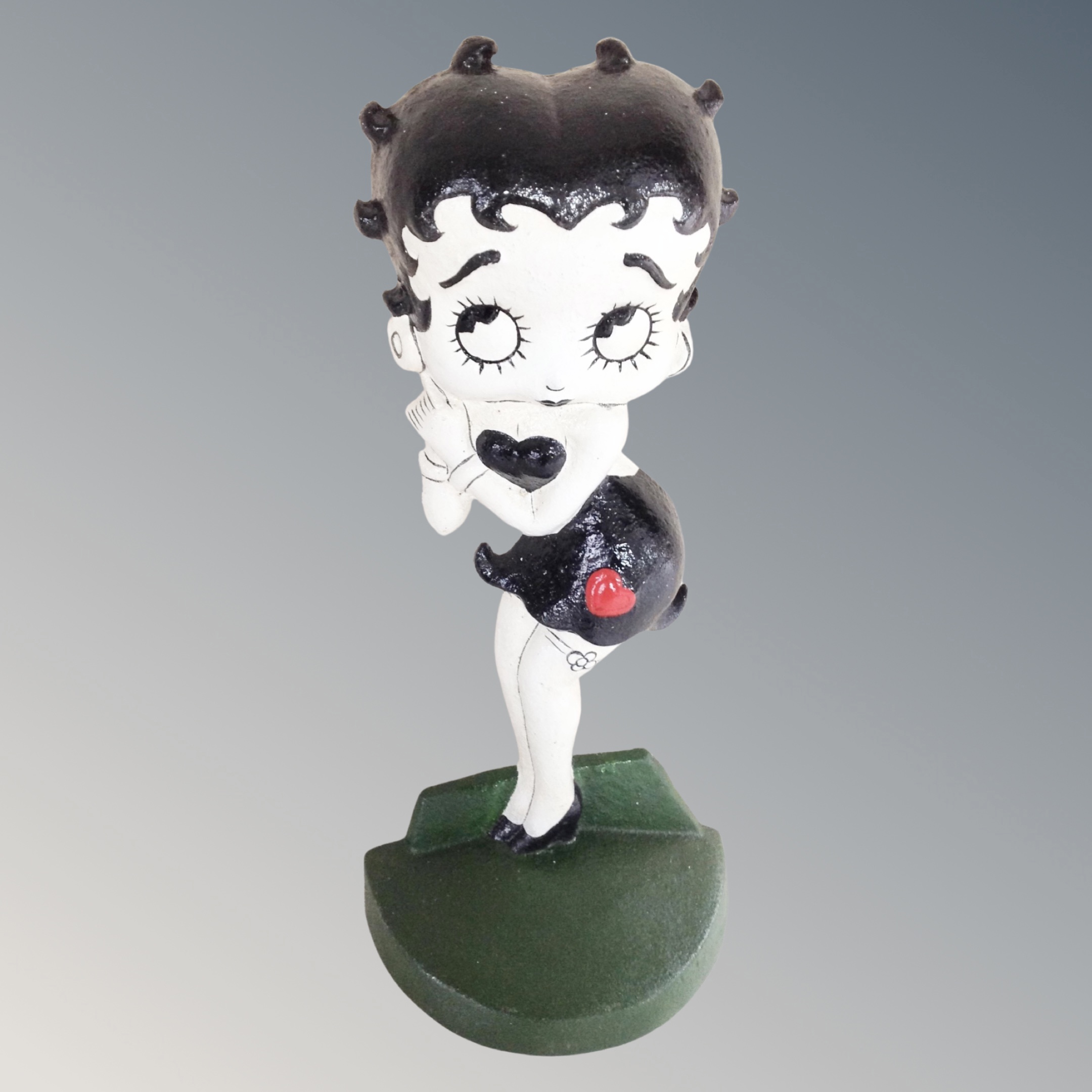 A cast iron Betty Boop doorstop.