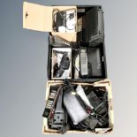 Two boxes of British Telecom and Panasonic vintage satellite phones and accessories