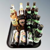 A tray containing 13 bottles of Crabbies alcoholic ginger beer, Newcastle Brown Ale and cider.