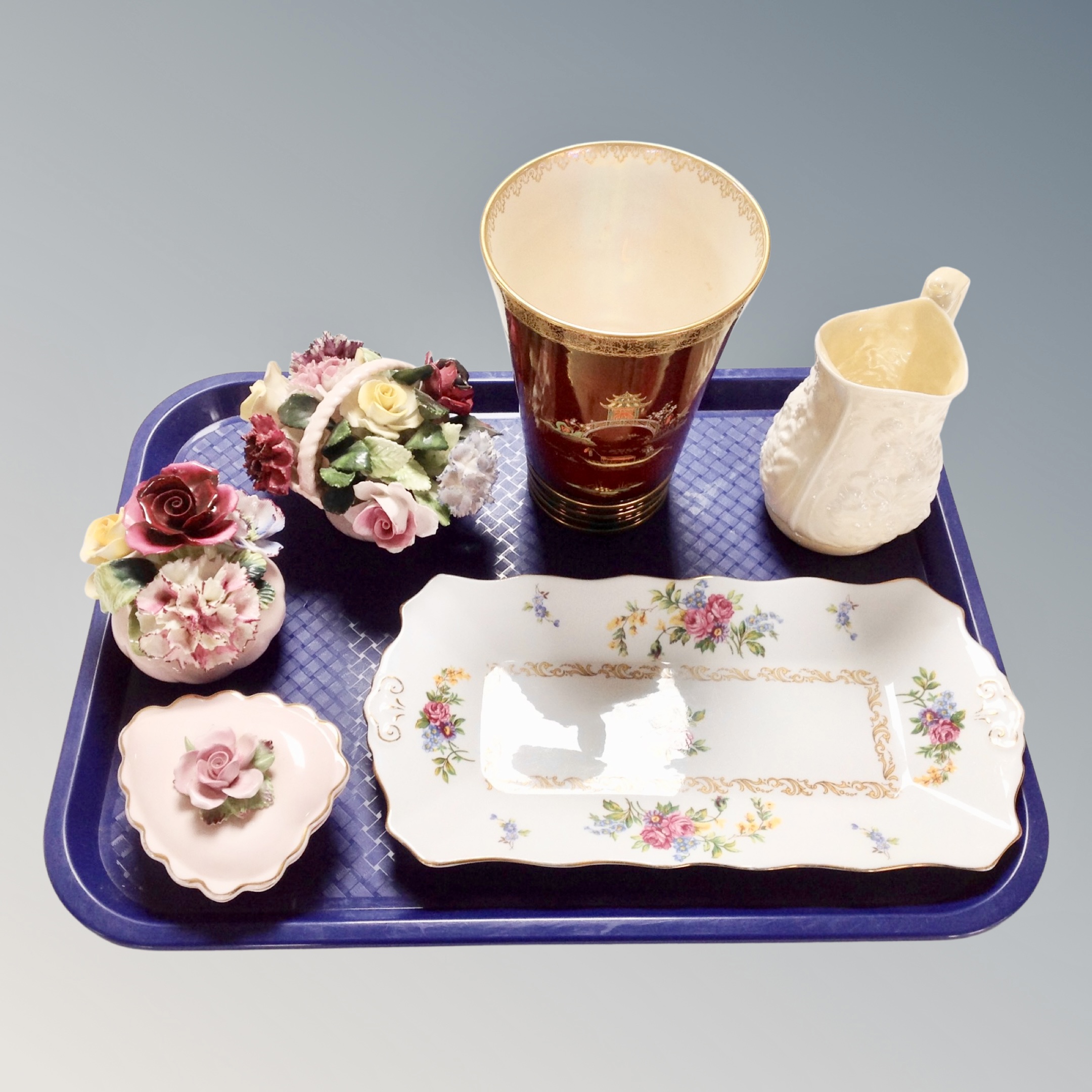 A tray containing a Belleek jug,