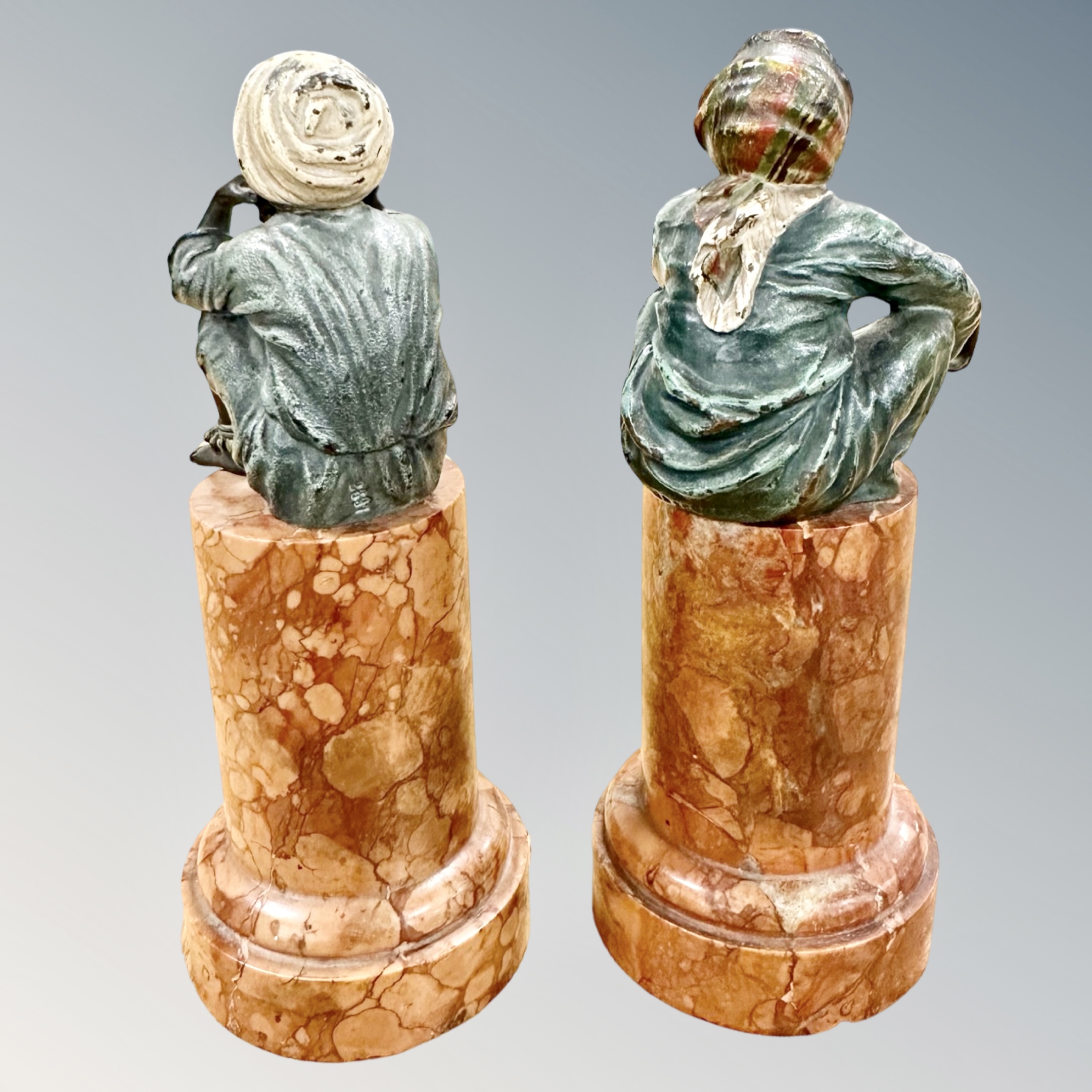 A pair of Franz Bergman coal-painted bronze figures of seated Arab children, upon later mottled, - Image 2 of 2