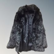 A vintage black fur coat