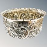 An embossed silver bowl, Sheffield marks, diameter 11cm. CONDITION REPORT: 113.