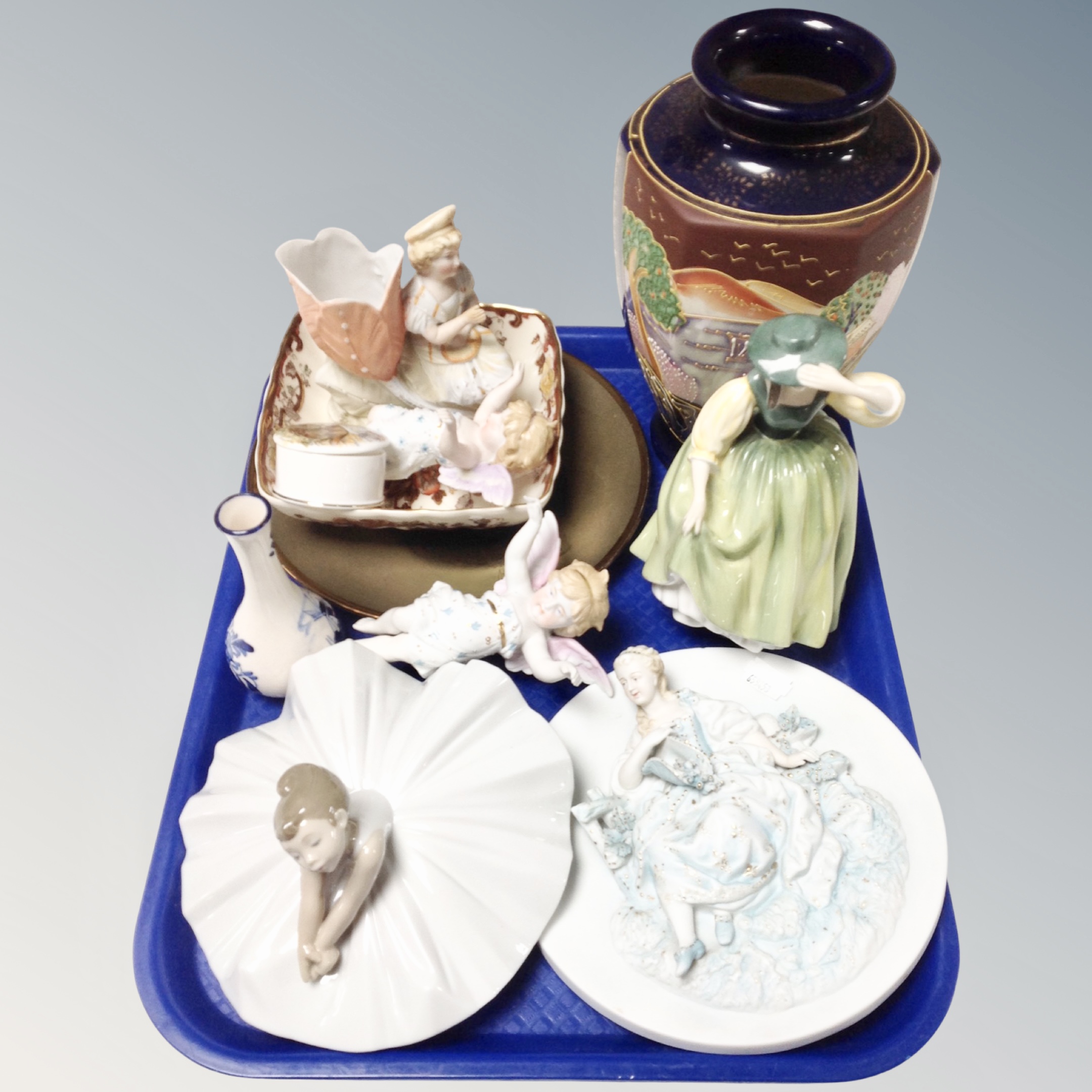 A tray of assorted ceramics, Nao figure of a ballerina, embossed wall plaque,