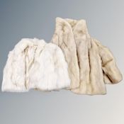A mink fur wrap together with a fur coat (Af)