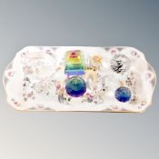 A Coalport Paradise china sandwich plate containing crystal figures and paperweights,