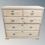 A Victorian pine five drawer chest with brass drop handles