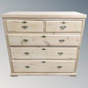 A Victorian pine five drawer chest with brass drop handles