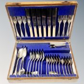 A 1930's canteen of silver plated and stainless steel cutlery