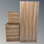 A four piece contemporary bedroom suite comprising of double door wardrobe, four drawer chest,