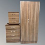A four piece contemporary bedroom suite comprising of double door wardrobe, four drawer chest,