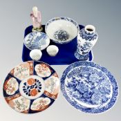 A tray of Oriental ceramics, Imari plate, Canton famille rose bowls,
