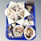 A tray of assorted costume jewellery, cameo brooches,