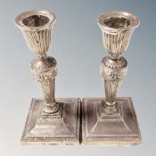 A pair of Victorian loaded silver candlesticks, London 1879, height 15.5 cm.