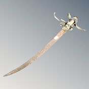 An antique curved sword.