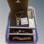 A tray of Swarovski necklace with matching further charm bracelet,
