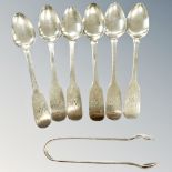 A set of silver Georgian silver teaspoons, Newcastle marks, together with a pair of silver tongs.