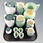 A tray of Denby pottery teapots, jugs, egg cups and preserve pots,