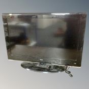A Bush 32 inch LCD TV with remote