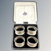 A boxed set of four silver napkin rings, Birmingham marks. CONDITION REPORT: 79.