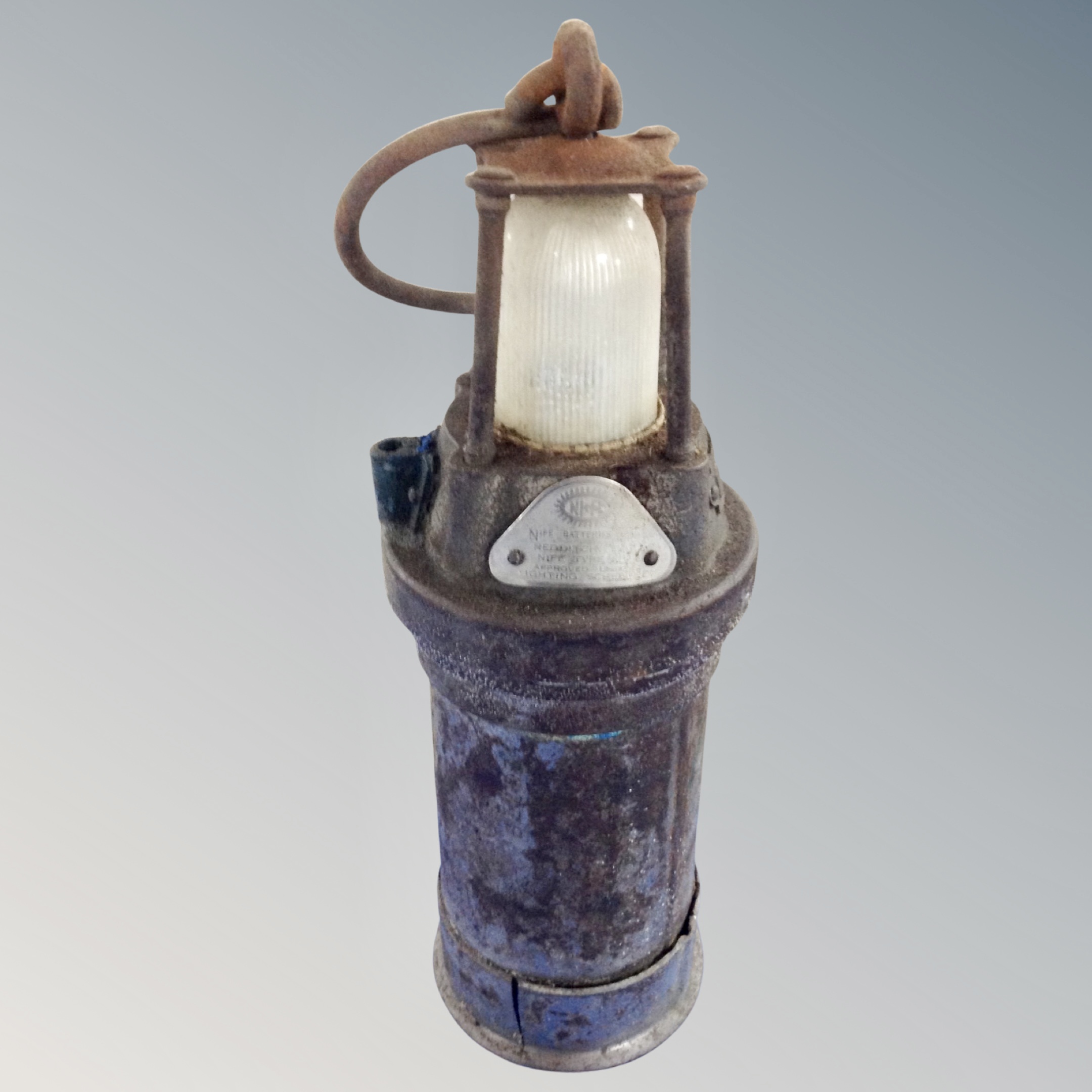 A vintage Nife Batteries Ltd lamp