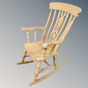 A pine farmhouse rocking chair