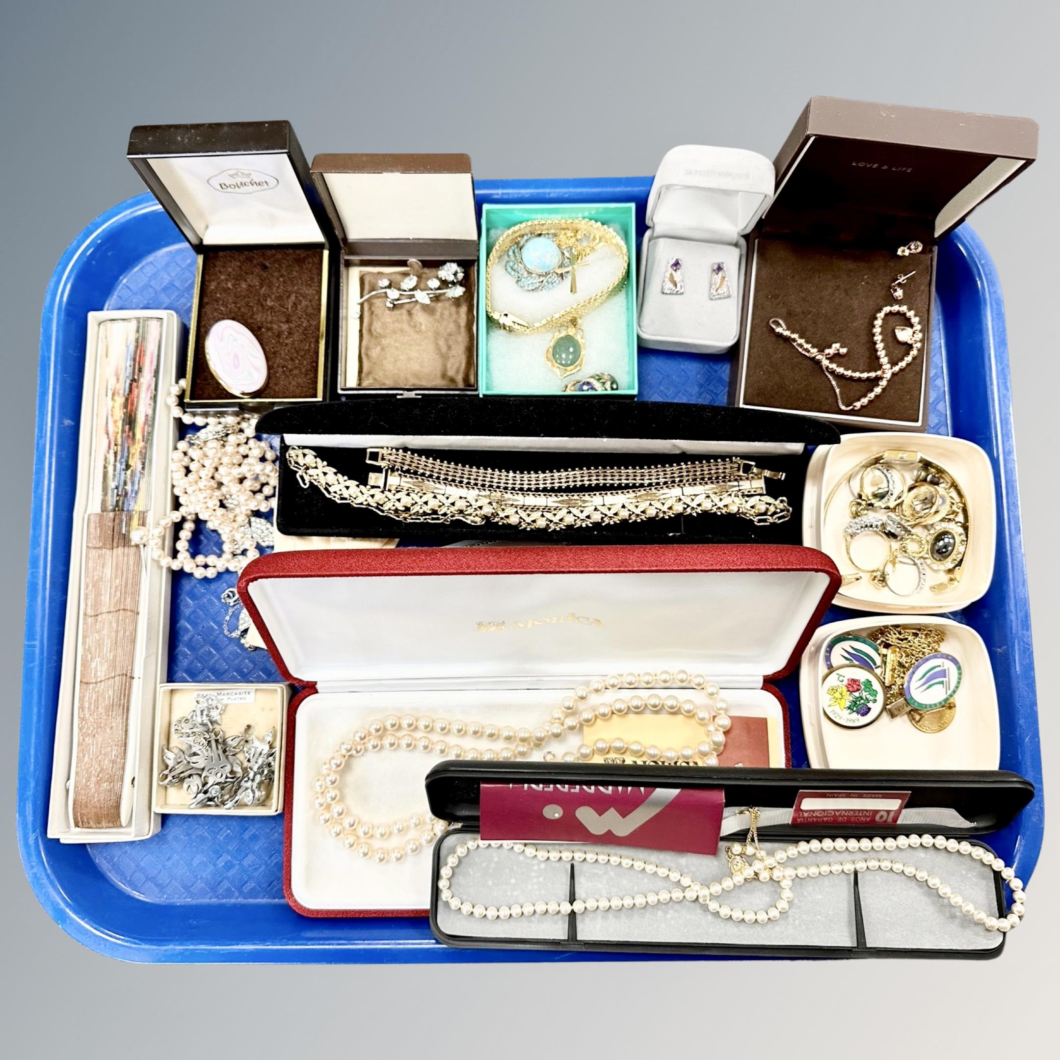 A tray of costume jewellery, hand fan,