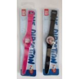 New One direction watches in original packaging (Batteries not included).