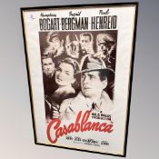 A framed movie poster : Casablanca, 71 cm x 102 cm CONDITION REPORT: Reproduction.