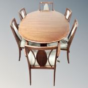 A 20th century oval G-plan dining table and six chairs
