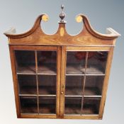 A George III inlaid mahogany bookcase top